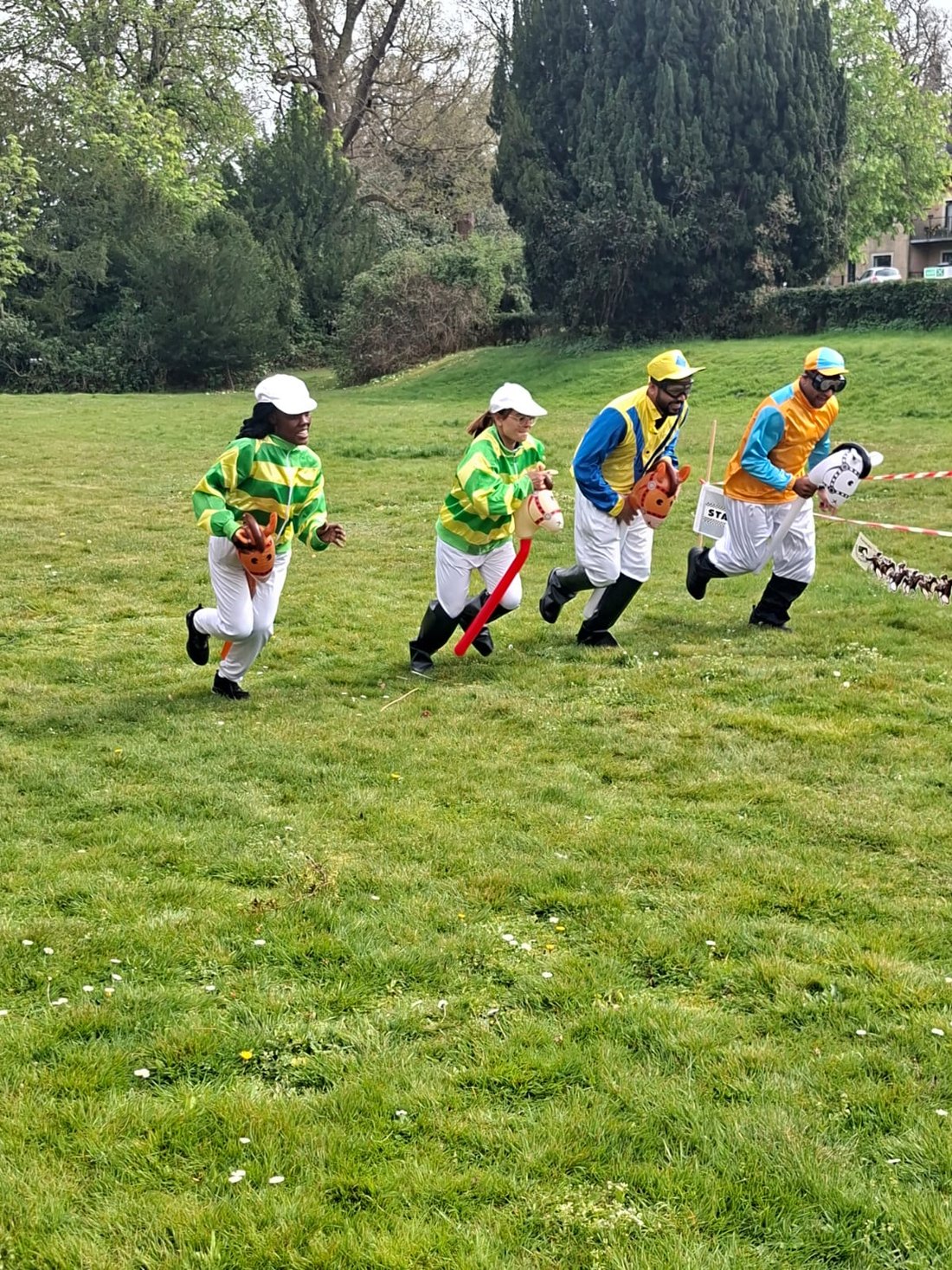 A mock horse race set up on the lawn for the home's Grand National day
